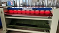 Machine de mesure à rouleaux pour peaux souples larges